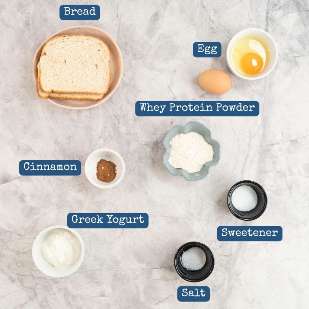 Ingredients for protein toast on marble bench top with text overlay.