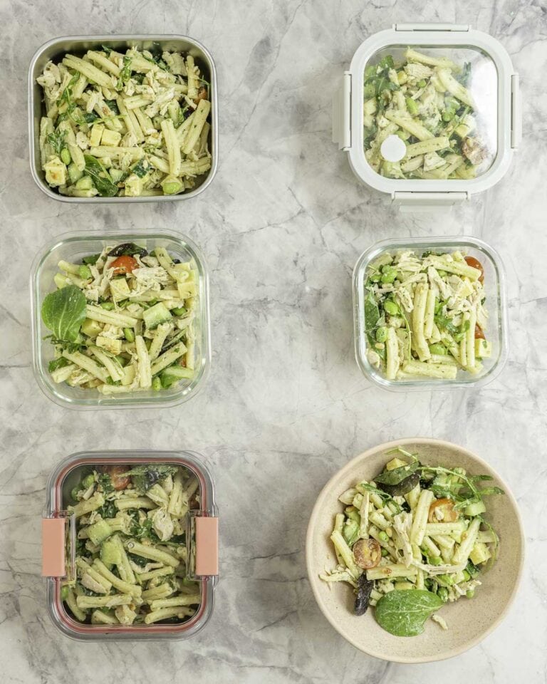 Pasta salad in 6 glass containers meal prepped for the week.