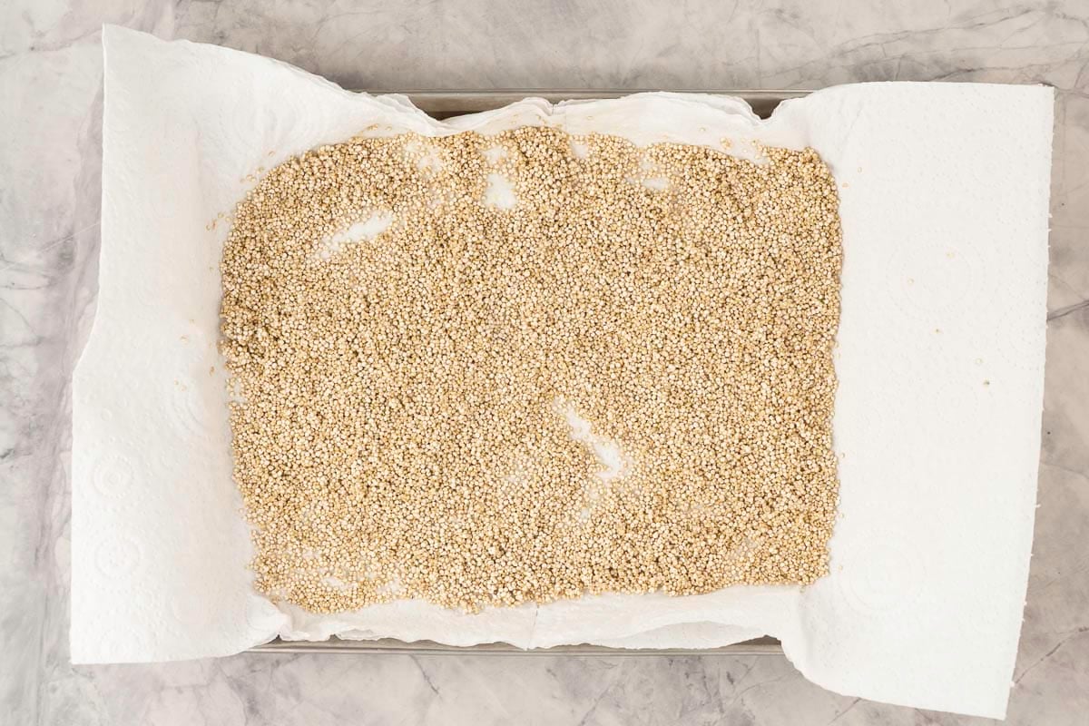 Quiona laid flat on a baking tray lined with paper towels.
