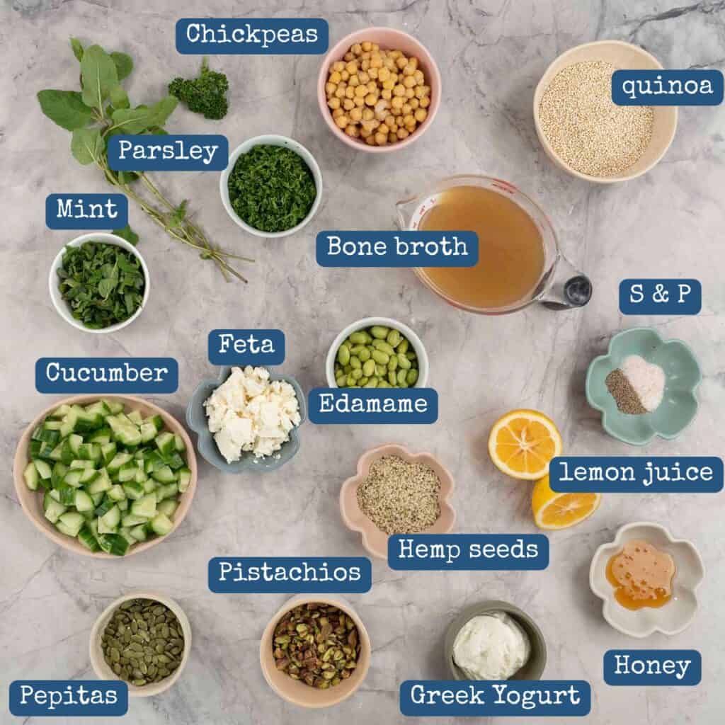 Ingredients for quinoa salad on bench top with text overlay.